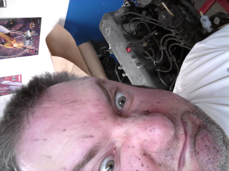 Anyone who’s ever tried to degrease a 300,000 mile diesel engine knows exactly what this face means. This better be worth it.